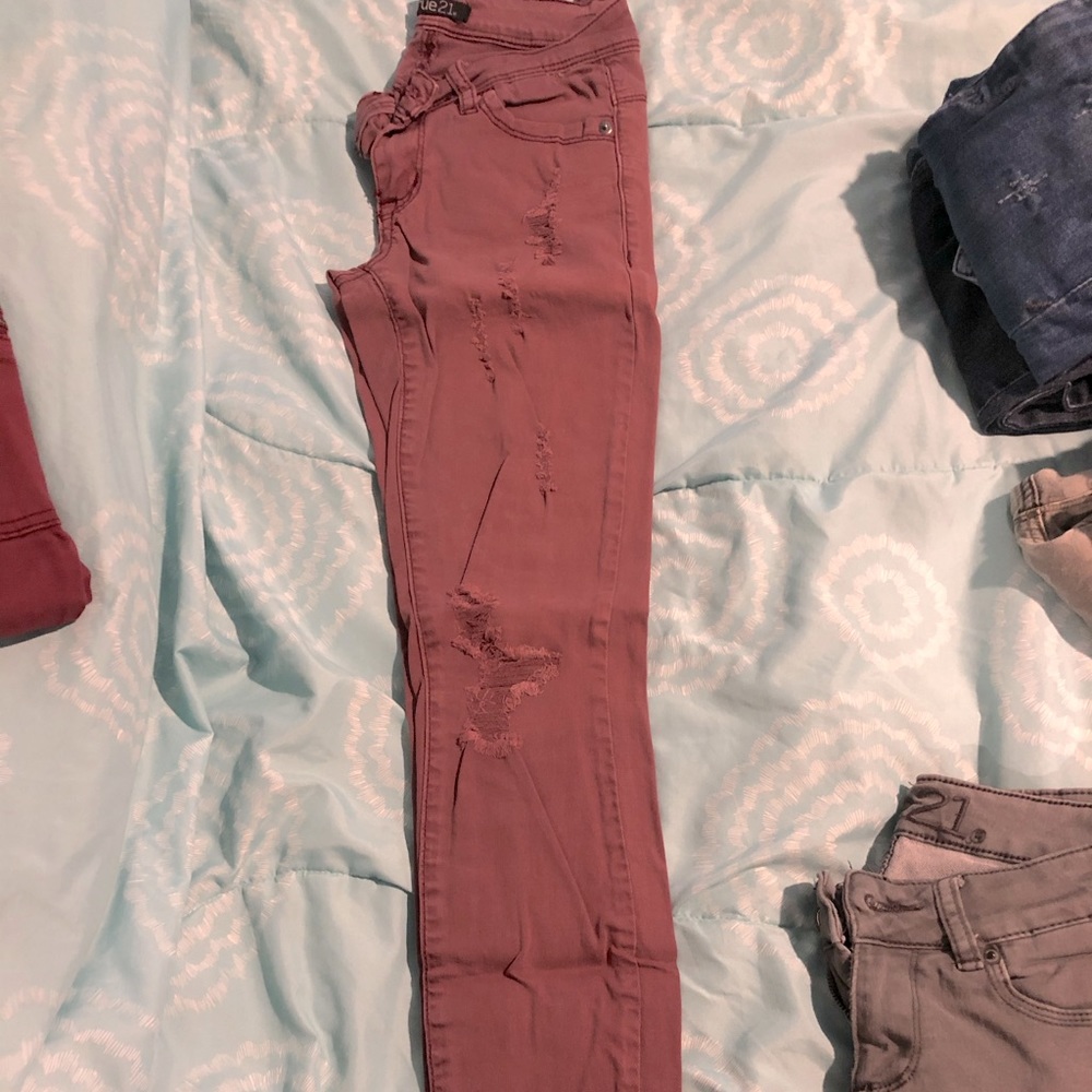 Pale purple distressed jeans